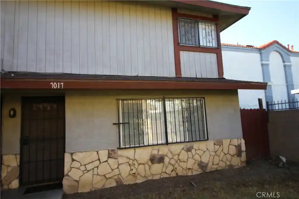 Listing Photo 1 - Condo for sale in 7017 Myrrh St located at 7017 Myrrh St, Paramount, CA 90723 - Unit 7017 Myrrh St