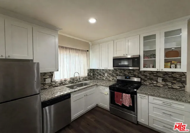 Photo 3 of Single family home for sale at 19604 Victory Blvd, Tarzana, CA 91335 | MLS# 26990867 | Listing updated on 2026-10-01