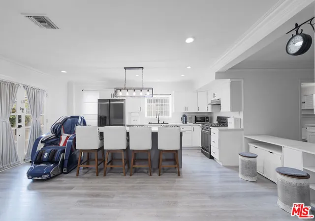Photo 3 of Single family home for sale at 1032 4th Avenue, Los Angeles, CA 90019 | MLS# 26991239 | Listing updated on 2026-09-29