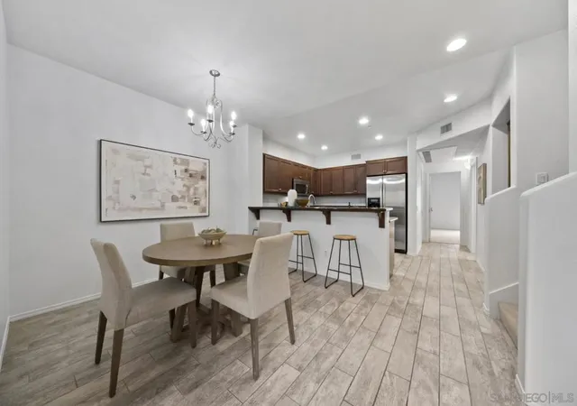 Listing Photo 1 - Condo for sale in building located at 5422 Zeil Pl, San Diego, CA 92105 - Unit #