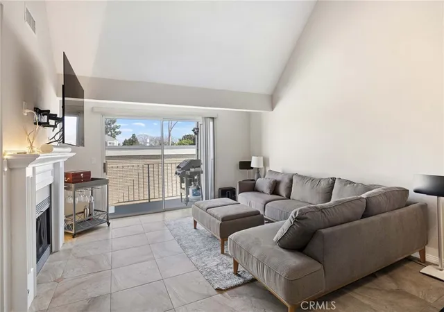 Listing Photo 1 - Condo for sale in building located at 810 Baker, Costa Mesa, CA 92626 - Unit #210
