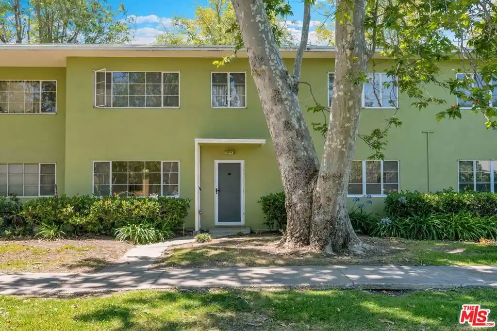 Listing Photo 1 - Condo for sale in 5516 Vlg Grn located at 5516 Vlg Grn, Los Angeles, CA 90016 - Unit 5516 Village Green
