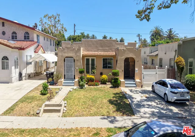 Photo 1 of Multi family home for sale at 936 S Lucerne Blvd, Los Angeles, CA 90019 | MLS# 26994573 | Listing updated on 2026-10-07