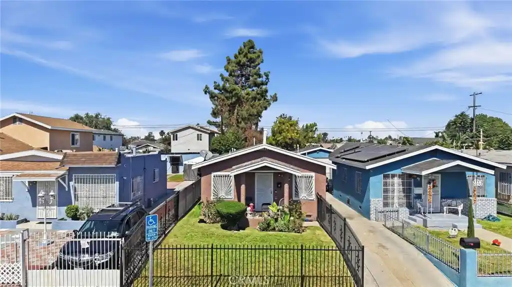 Single family home for sale at 201 E 111th Place, Los Angeles, CA 90061 | MLS# PW26212810