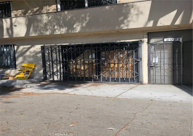 Listing Photo 1 - Condo for sale in building located at 2921 W Florence, Los Angeles, CA 90043 - Unit #