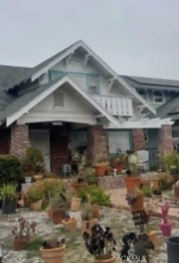 Single family home for sale at 1563 West 49th, Los Angeles, CA 90062 | MLS# OC26213036