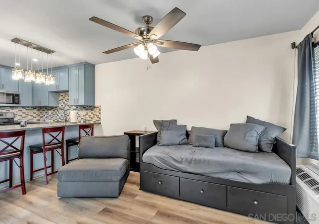 Listing Photo 1 - Condo for sale in building located at 1631 Bayview Hts, San Diego, CA 92105 - Unit #12