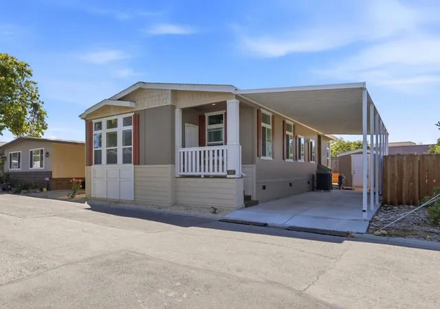 Photo 3 of Manufactured home for sale at 406 Los Encinos Ave #406, San Jose, CA 95134 | MLS# ML82063159 | Listing updated on 2026-10-09