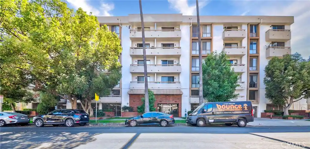 Listing Photo 1 - Condo for sale in St Andrews Courtyard located at 533 S St Andrews Pl, Los Angeles, CA 90020 - Unit #408