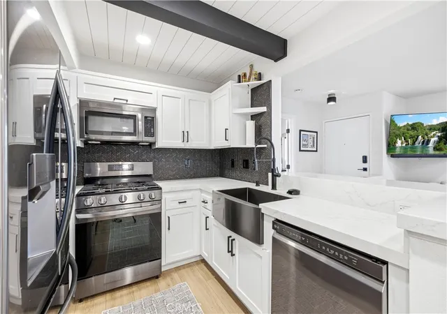 Photo 1 of Condo for sale at 24413 Leonard Tree #203, Newhall, CA 91321 | MLS# SR26213817 | Listing updated on 2026-10-09