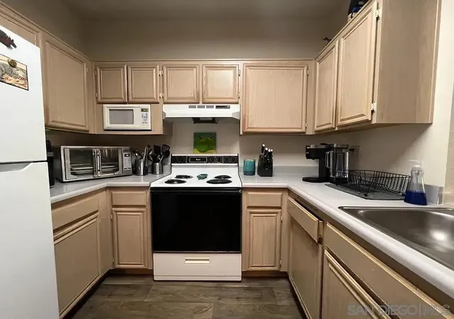 Listing Photo 1 - Condo for sale in building located at 17161 Alva Rd, San Diego, CA 92127 - Unit #212