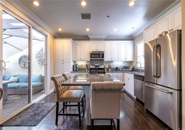Listing Photo 1 - Condo for sale in building located at 597 S Kroeger St, Anaheim, CA 92805