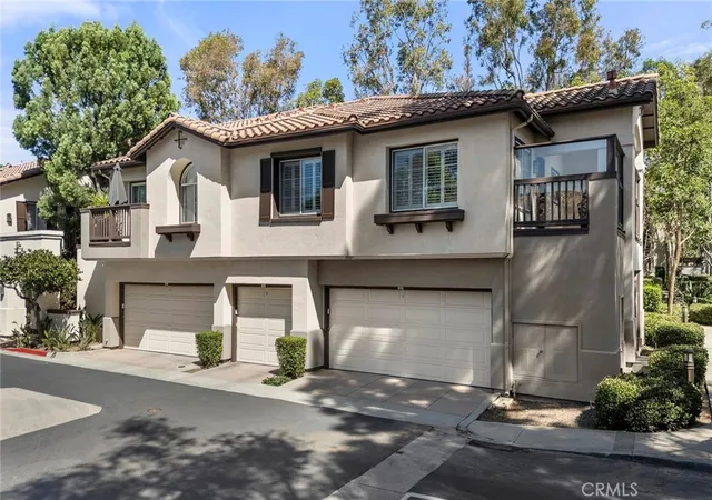 Listing Photo 1 - Condo for sale in building located at 2960 Champion, Tustin, CA 92782 - Unit #408