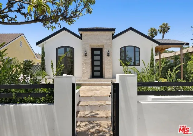 Single family home for sale at 1707 S Stanley Ave, Los Angeles, CA 90019 | MLS# 26995531