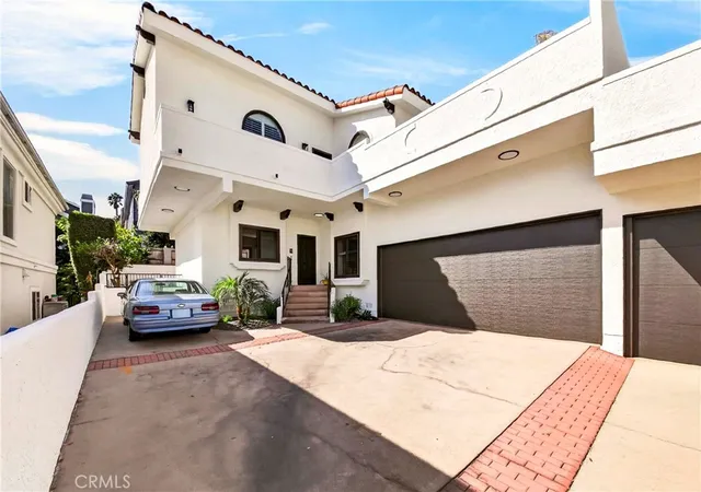 Photo 1 of Townhouse for sale at 2402 Clark Ln #B, Redondo Beach, CA 90278 | MLS# SB26215249 | Listing updated on 2026-10-07