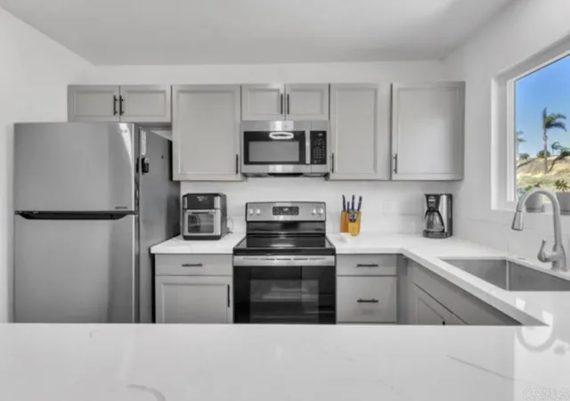 Listing Photo 3 - Condo for sale in building located at 1679 Pentecost Wy, San Diego, CA 92105 - Unit #6