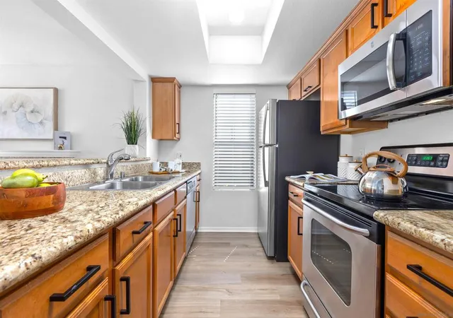 Listing Photo 1 - Condo for sale in building located at 14978 Avenida Venusto, San Diego, CA 92128 - Unit #57