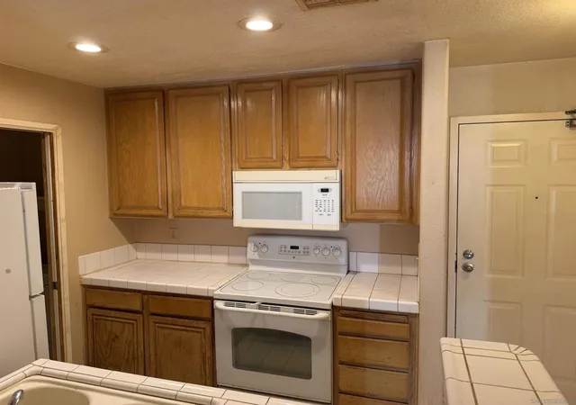 Listing Photo 1 - Condo for sale in building located at 3969 Mahaila, San Diego, CA 92122 - Unit #106