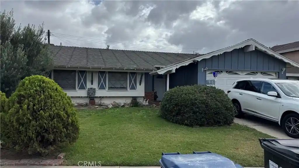Single family home for sale at 312 East 142nd St, Los Angeles, CA 90061 | MLS# SB26222793