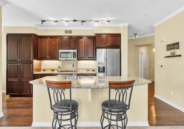 Listing Photo 1 - Condo for sale in building located at 8355 Station Vlg Ln, San Diego, CA 92108 - Unit #4219