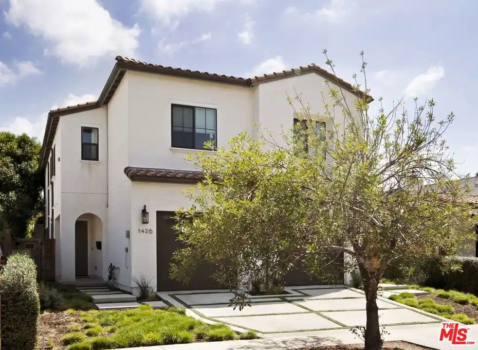 Photo 1 of Townhouse for sale at 1426 S Sierra Bonita Ave, Los Angeles, CA 90019 | MLS# 26103630 | Listing updated on 2026-10-27
