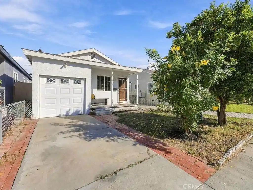 Single family home for sale at 12261 211 Street, Lakewood, CA 90715 | MLS# PW26227743