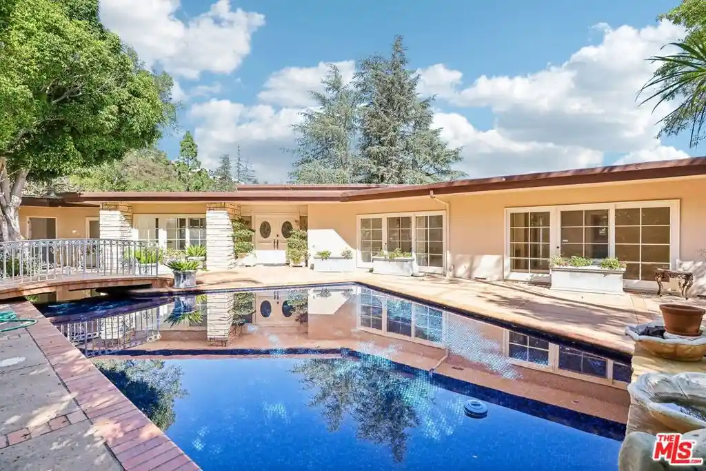 Single family home for sale at 1743 Stone Cyn Rd, Los Angeles, CA 90077 | MLS# 26104009