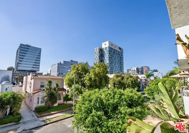Listing Photo 1 - Condo for sale in The Vogue Condominiums located at 6151 Orange St, Los Angeles, CA 90048 - Unit #201