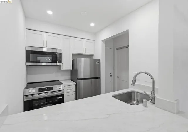 Listing Photo 1 - Condo for sale in building located at 77 Fairmount Ave, Oakland, CA 94611 - Unit #112