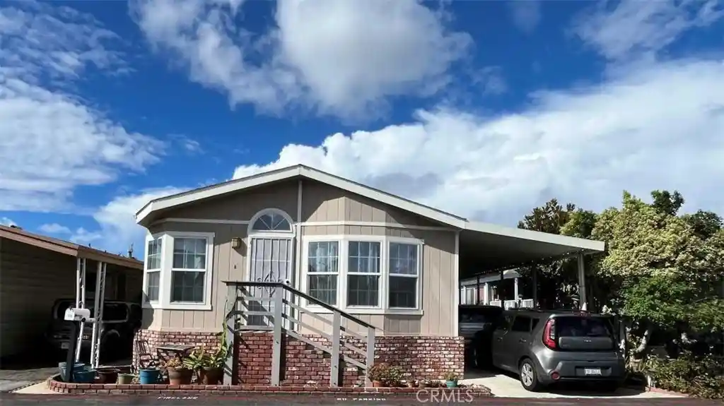 Photo 1 of Manufactured home for sale at 129 Pecan Ln, Fountain Valley, CA 92708 | MLS# OC26230129 | Listing updated on 2026-10-24