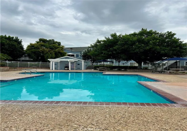 Listing Photo 1 - Condo for sale in building located at 12864 Sycamore Vlg, Norwalk, CA 90650 - Unit #
