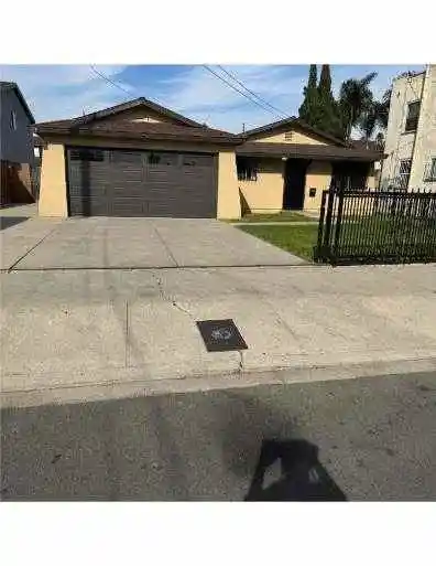 Single family home for sale at 527 West 93rd, Los Angeles, CA 90044 | MLS# CV26232739