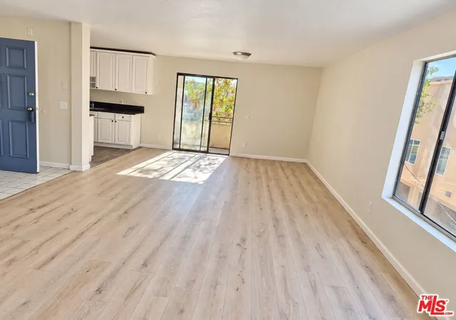 Listing Photo 1 - Condo for sale in building located at 10901 Laurel Cyn Blvd, San Fernando, CA 91340 - Unit #209