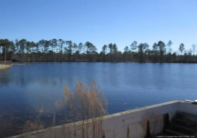 Photo 1 of Land for sale at 5869 Permastone Lake Rd, Hope Mills, NC 28348 | MLS# 738187 | Listing updated on 2026-07-18