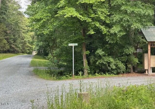 Photo 3 of Unimproved Land at 9033 Collins Crk Dr, Chapel Hill, NC 27516 | MLS# 10096927 | | Sold on 2026-07-06