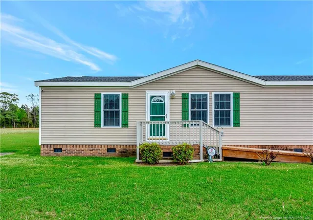 Photo 2 of Manufactured home for sale at 387 Bourbon St, Lumberton, NC 28358 | MLS# 751102 | Listing updated on 2026-09-01