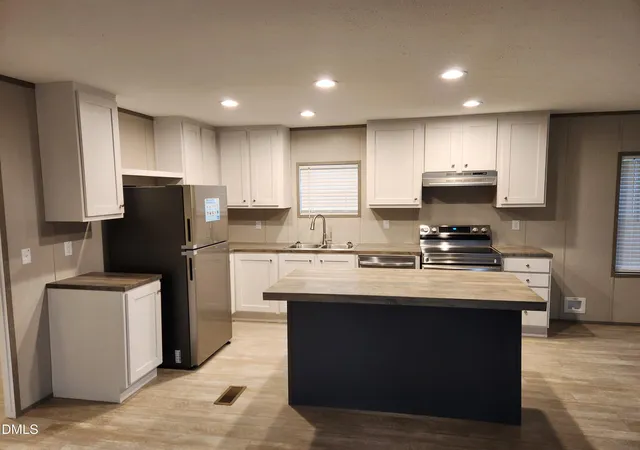 Photo 4 of Manufactured home for sale at 392 Monroe Ln, Erwin, NC 28339 | MLS# 10138378 | Listing updated on 2026-09-26