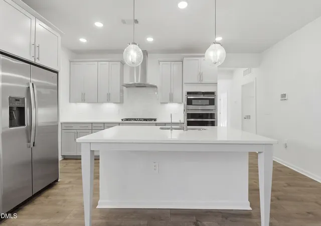 Photo 4 of Single family home for sale at 1003 Plath Dr, Durham, NC 27703 | MLS# 10151731 | Listing updated on 2026-09-14