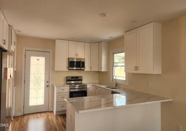 Photo 2 of Single family home for sale at 910 Ruby St, Durham, NC 27704 | MLS# 10147078 | Listing updated on 2026-07-18