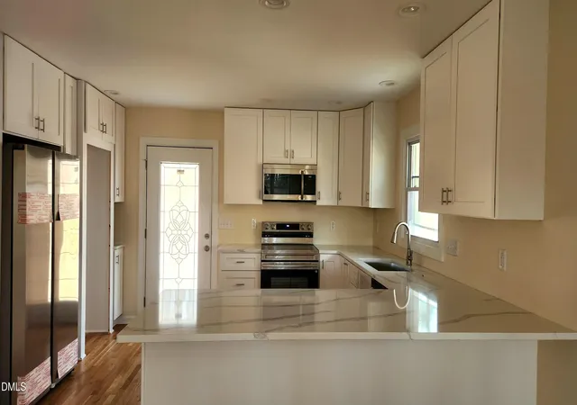 Photo 3 of Single family home for sale at 910 Ruby St, Durham, NC 27704 | MLS# 10147078 | Listing updated on 2026-07-18
