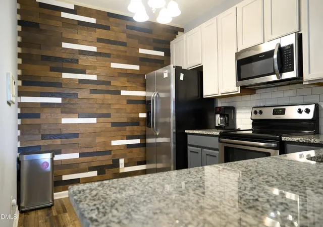Photo 3 of Townhouse for sale at 411 Coalinga Ln #104, Raleigh, NC 27610 | MLS# 10150668 | Listing updated on 2026-07-18