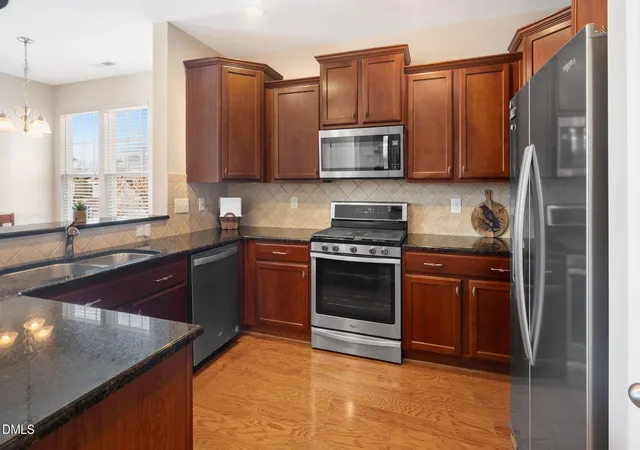 Photo 3 of Townhouse for sale at 9312 Wooden Rd, Raleigh, NC 27617 | MLS# 10154380 | Listing updated on 2026-09-11