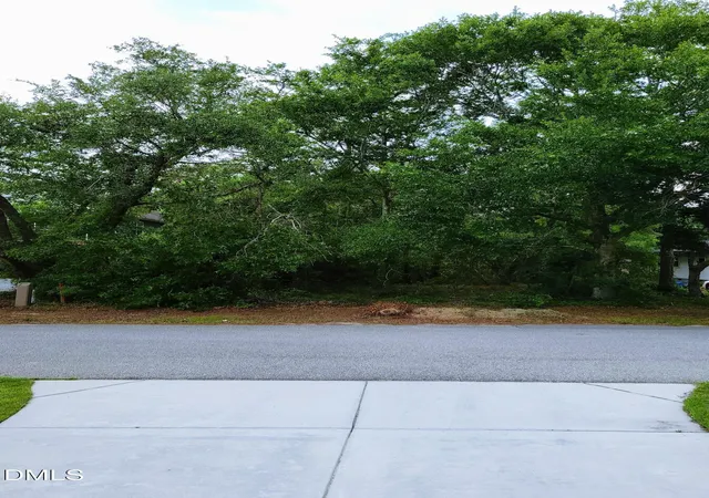 Photo 1 of Land for sale at 145 Ne 4th St, Oak Island, NC 28465 | MLS# 10154056 | Listing updated on 2026-08-27