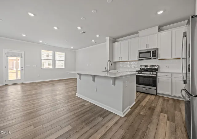 Photo 4 of Townhouse for sale at 5717 Woodlawn Dr, Durham, NC 27703 | MLS# 10160180 | Listing updated on 2026-09-23