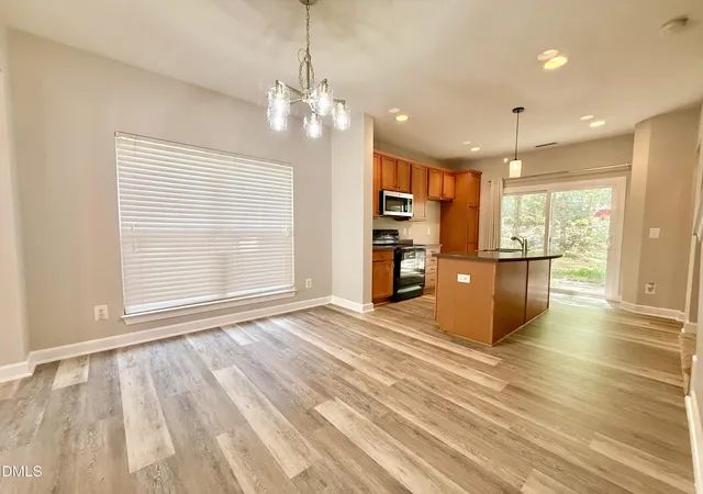 Photo 4 of Townhouse for sale at 8815 Orchard Grv Way, Raleigh, NC 27612 | MLS# 10160724 | Listing updated on 2026-07-18