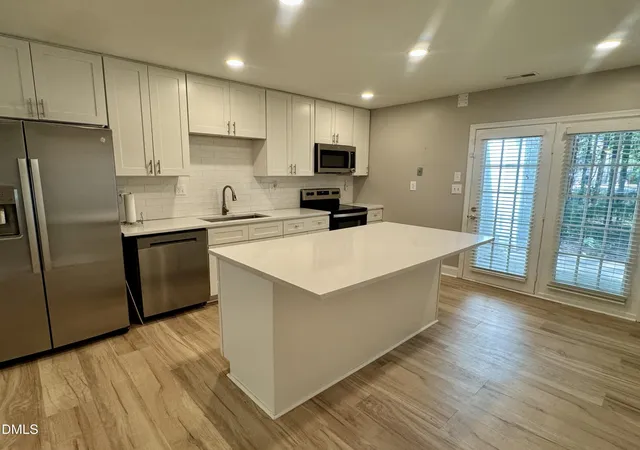 Photo 3 of Townhouse for sale at 7925 Brown Bark Pl, Raleigh, NC 27615 | MLS# 10161347 | Listing updated on 2026-09-15