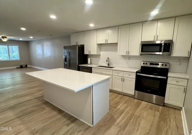 Photo 4 of Townhouse for sale at 7925 Brown Bark Pl, Raleigh, NC 27615 | MLS# 10161347 | Listing updated on 2026-09-15