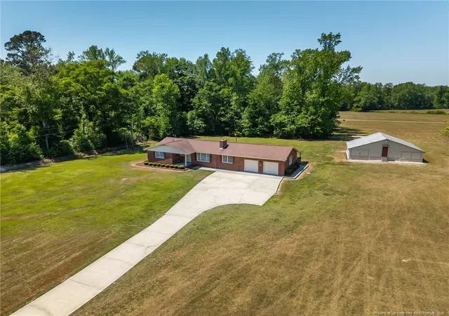 Photo 5 of Single Family Residence at 2023 Mercer Ml Rd, Lumberton, NC 28358 | MLS# 761330 | | Sold on 2026-06-04