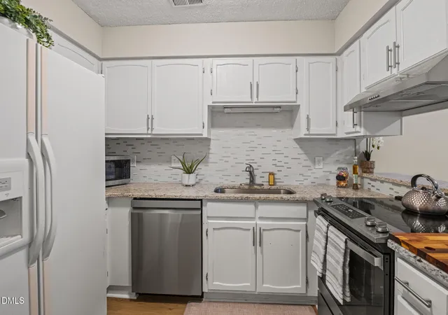 Photo 3 of Townhouse for sale at 30 Stonewall Way, Durham, NC 27704 | MLS# 10165652 | Listing updated on 2026-09-18