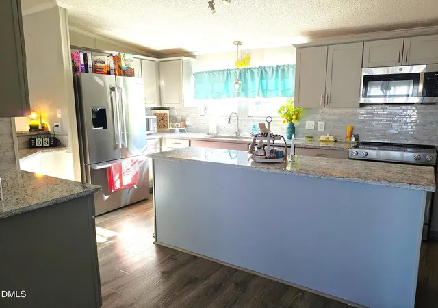 Photo 3 of Manufactured home for sale at 87 E Williams St, Coats, NC 27521 | MLS# 10164604 | Listing updated on 2026-07-18